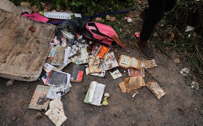 A child's backpack and books covered with dirt by the ruins of the Palestinian house demolished by Israeli forces in Sheikh Jarrah. AFP