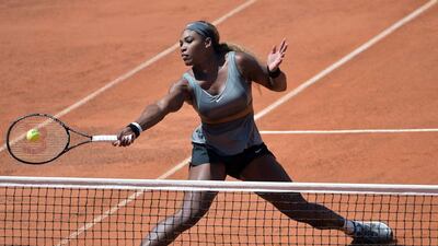 Serena Williams of the US returns a ball during the WTA Rome's Tennis Masters final against Sara Errani of Italy on May 18, 2014, at the Foro Italico in Rome. Williams won 6-3, 6-0. AFP PHOTO / GABRIEL BOUYS