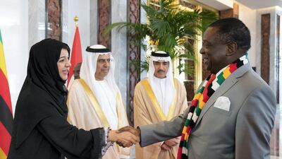 Reem Ibrahim Al Hashimi, UAE Minister of State for International Cooperation greets Emmerson Mnangagwa, President of Zimbabwe, during a reception at the Presidential Airport. Ryan Carter for the Ministry of Presidential Affairs