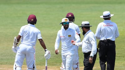 It looks like Dinesh Chandimal, centre, may be in trouble with the authorities. Randy Brooks / AFP