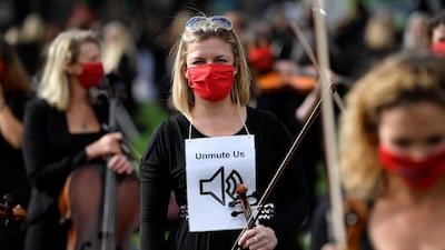 Musicians perform near the Houses of Parliament during a protest highlighting their inability to perform live or work during the pandemic. These musicians are facing a different kind of challenge these days. Reuters