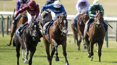 Kameko, left, ridden Oisin Murphy approaches the finish line to win the 2000 Guineas Stakes at Newmarket Racecourse. Getty Images