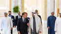 ABU DHABI, UNITED ARAB EMIRATES - October 19, 2026: HH Sheikh Mohamed bin Zayed Al Nahyan, President of the United Arab Emirates (center R), receives HE Emmanuel Macron, President of France (center L), during an official visit reception. ( Ryan Carter / UAE Presidential Court ) ---