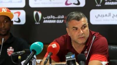 The Al Ahli coach Cosmin Olaroiu talks to the media ahead of tonight's Super Cup match against Al Ain. Ravindranath K / The National
