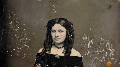 A daguerreotype metal plate photograph of an unidentified young woman who the scientific mission recovery team nicknamed 'Mona Lisa of the Deep.'