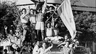 Young Jews in Tel Aviv celebrate the proclamation of the new state of Israel on May 14, 1948. AFP