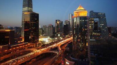 Beijing's central business district houses one of China's tallest buildings, the China World Trade Center, left. AP Photo