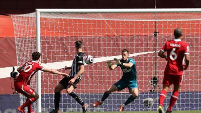 Newcastle keeper Martin Dubravka saves from Liverpool's Diogo Jota. AP