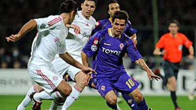 Bayern, in white, had to contend with Fiorentina's in-form Adrian Mutu on Wednesday.
