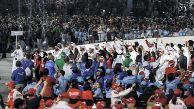 The United Arab Emirates Special Olympics team enters Sheikh Zayed Sports City stadium. Antonie Robertson/The National