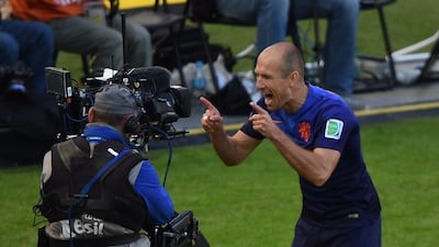 Arjen Robben celebrates his goal against Australia on Wednesday at the 2014 World Cup in Porto Alegre, Brazil. Luis Acosta / AFP
