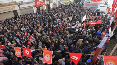 Tunisians take part in a rally marking the ninth anniversary of the 2011 uprising, at Habib Bourguiba Avenue in Tunis on January 14, 2020. AFP