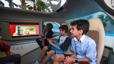 Students from the International School of arts and Science watch the Smart Monitor of the Autonomous Smart Car. Victor Besa for The National.