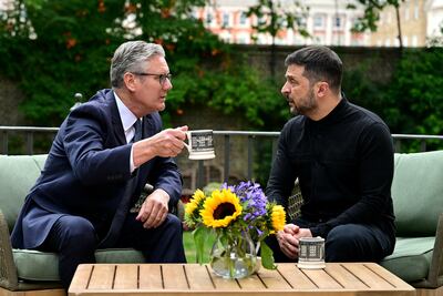 Britain's Prime Minister Keir Starmer, left, with Ukraine's President Volodymyr Zelenskyy in the garden of 10 Downing Street in London on Thursday. Reuters