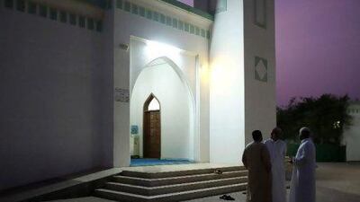 Residents of Mohadhub village near Falaj Al Moalla in Umm Al Quwain gather outside the Aqeel Ibn Abi Talib mosque.