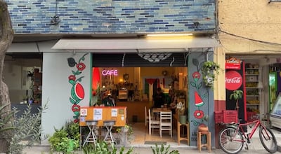 Watermelon motifs, a symbol of Palestinian solidarity, outside the cafe, which opened in 2024. The National