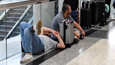 Passengers wait after their flights were delayed or cancelled at Rafik Hariri International Airport in Beirut, Lebanon, on June 13. EPA