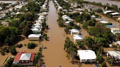 Floodwaters spread through Rockhampton in eastern Queensland. The storms have killed at least eight, destroyed roads and cut rail lines. AFP