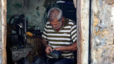 Fellow cobbler Walid al-Suri, 58, said 'It's true that our work has increased' but 'there are no profits because the price of all the materials has gone up, from glue to needles, thread and nails'