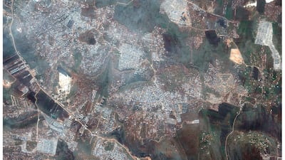This combination of satellite images provided by Maxar Technologies shows an area near Kafaldin in northern Syria's Idlib province near the Turkish border on Feb. 5, 2019, top, and the same area with a large number of refugee tents for internally displaced people on Feb. 16, 2020, bottom. AP