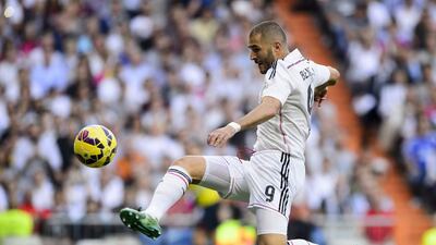 Real Madrid's Karim Benzema controls the ball during his side's La Liga victory over Barcelona on Saturday at the Santiago Bernabeu. Benzema scored Madrid's third goal. Dani Pozo / AFP / October 25, 2014