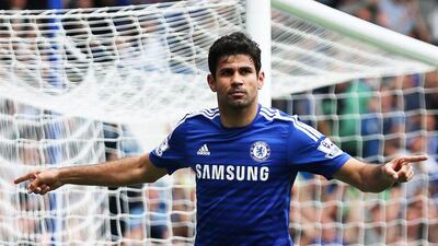 =Chelsea's Diego Costa celebrates after scoring his side's second goal in a 3-0 win over Aston Villa in the Premier League on Saturday at Stamford Bridge. Kieran Galvin / EPA / September 27, 2014
