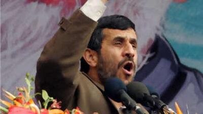 Mahmoud Ahmadinejad, the Iranian president, gestures under a potrait of supreme leader Ayatollah Ali Khamenei. Khamenei urged Ahmadinejad to prepare for another term.