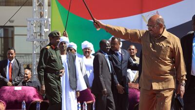 Sudanese President Omar Al Bashir greets his supporters at a rally in Khartoum, Sudan, January 9, 2019. AP