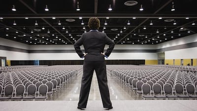 A woman prepares for a talk by striking the stance both ‘proven’ and ‘refuted’ to boost confidence. Corbis