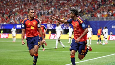 Lamine Yamal celebrates with teammate Rodri after scoring Spain's first goal during their World Cup Group H match against Saudi Arabia at the Atlanta Stadium in Georgia. AFP