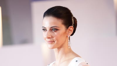 Barbara Ronchi in Valentino on the red carpet ahead of the movie 'Padrenostro' at the 77th Venice Film Festival. Getty Images