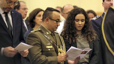 People attend the Remembrance Sunday service at St Andrew's Church