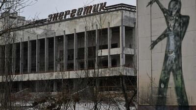Graffiti on a building wall on the central square of the ghost town of Pripyat, not far from Chernobyl nuclear power plant. AFP
