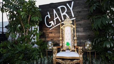 'Gary' the pet snail sits on his shrine before the unveiling event. Reuters