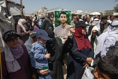 Palestinians in Gaza attend a protest on Palestinian Prisoners Day, denouncing the law permitting the execution of Palestinian prisoners in Israeli prisons. EPA