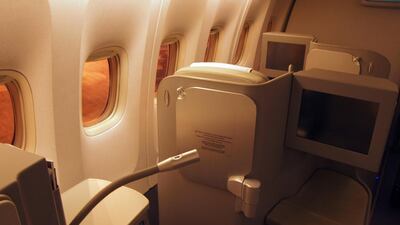 The seat comes with a table with enough room for a laptop for work. Courtesy Jonny Clark