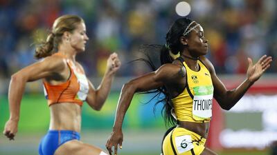 Elaine Thompson, right, beats Dafne Schippers, left, in the 200m final at the 2016 Rio Olympics. Yoan Valat / EPA / August 17, 2016