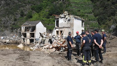 Emergency crews stand by in Mayschoss, Rhineland-Palatinate, Germany, after devastating floods. AFP