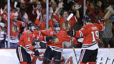 Chicago Blackhawks right wing Patrick Kane (88) has been celebrating scoring a lot of goals this season, so much so he had a chance at the NHL scoring title until his injury. Nam Y Huh / AP Photo