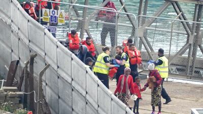 Migrants are taken in to Dover, Kent, by the Border Force after being rescued from a small boat in the English Channel on July 20. PA