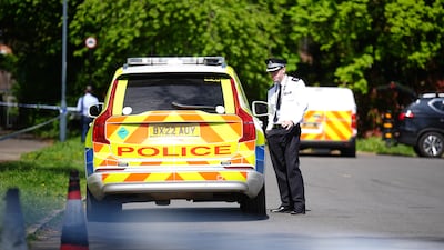 A police officer outside the Kenton United Synagogue. PA