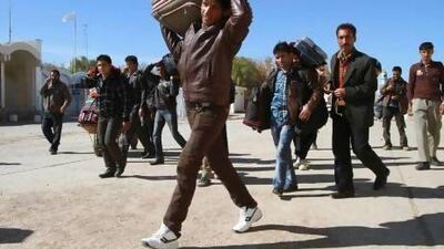 Migrant workers return home to Afghanistan via the Islam Qala border in Herat province after leaving Iran.