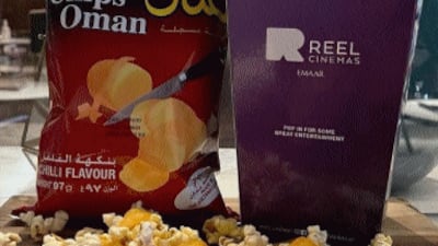 Chips Oman and popcorn make for an addictive snacking combination at Reel Cinemas. Courtesy Reel Cinemas