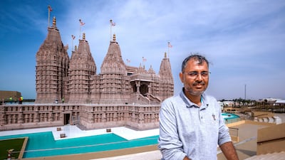 Mr Raval on the ghats, or steps, that overlook the temple to evoke the feeling of sitting on a riverbank in India. Victor Besa / The National