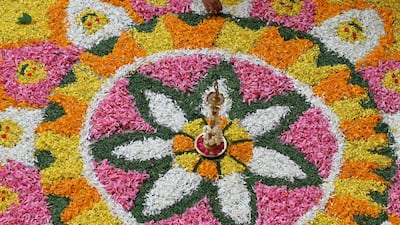 A floral rangoli as part of the Onam festival celebrations at a school in Chennai. AFP