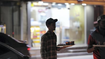 Ras Al Khaimah, United Arab Emirates - November 27th, 2019: National Day feature on Rounding where people drink tea in their cars. Wednesday, November 27th, 2019, Ras Al Khaimah. Chris Whiteoak / The National