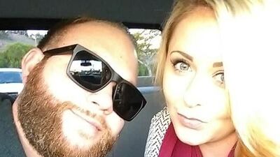 Christopher Christopher Roybal, left, is seen with his wife Dixie Roybal. Social media / Handout via Reuters