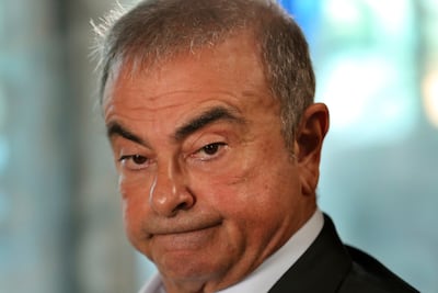 Nissan's former chairman Carlos Ghosn speaks during an interview in Lebanon. Greg Kelly a former executive at the Japanese car maker was charged with financial wrongdoing in under-reporting the compensation of Mr Ghosn, his former boss. AP