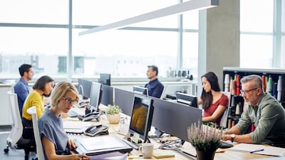 A global survey found more than a quarter of UAE employers are engaged and thriving in the workplace. Photo: Morsa Images