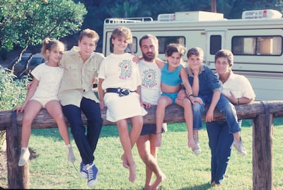The Phoenix family circa 1986; L-R Summer Phoenix, River Phoenix, Liberty Phoenix, John Lee Phoenix, Rain Phoenix, Joaquin Phoenix, Arlyn Phoenix. Getty Images